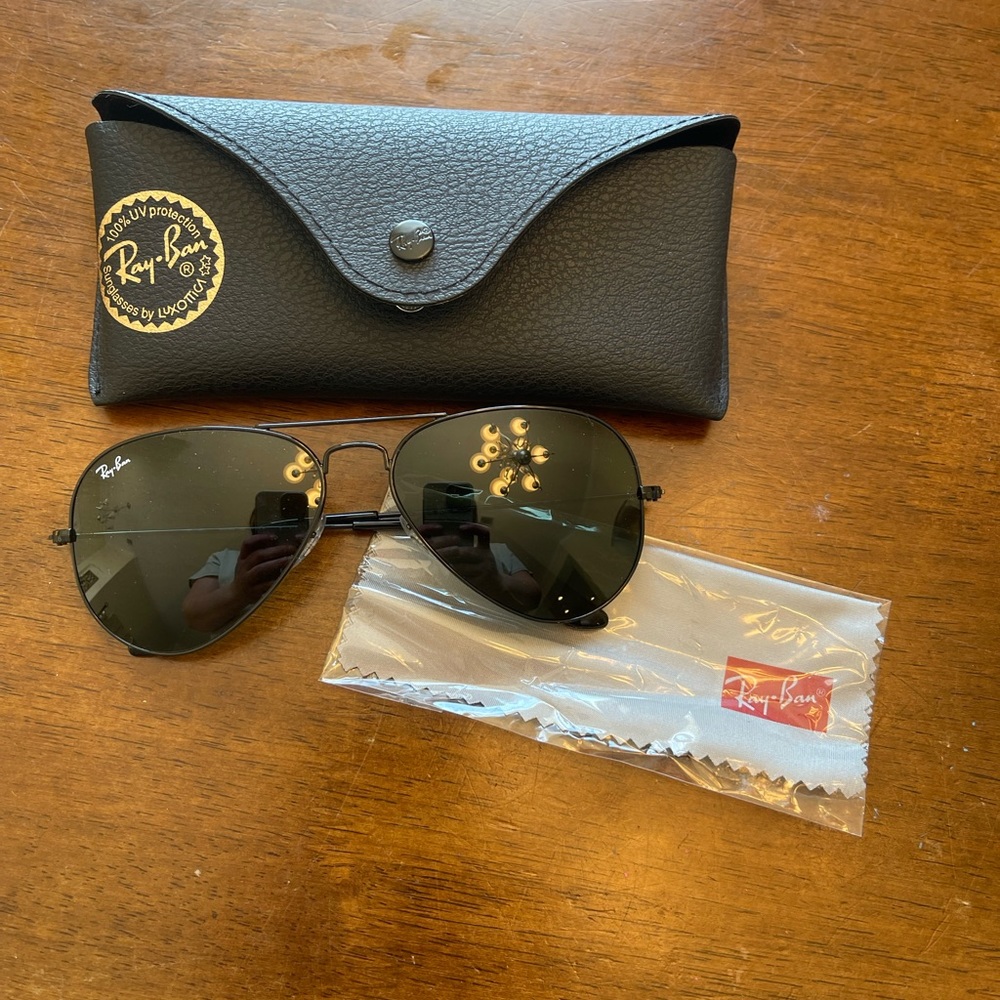 New ray ban black aviators.